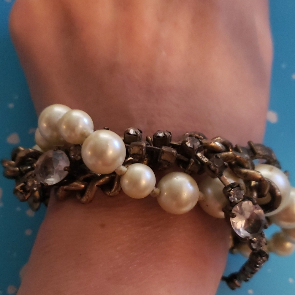 Brass & pearl w/ 2 Crystal links.